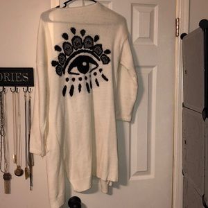 Large evil eye cardigan/sweater with pockets.